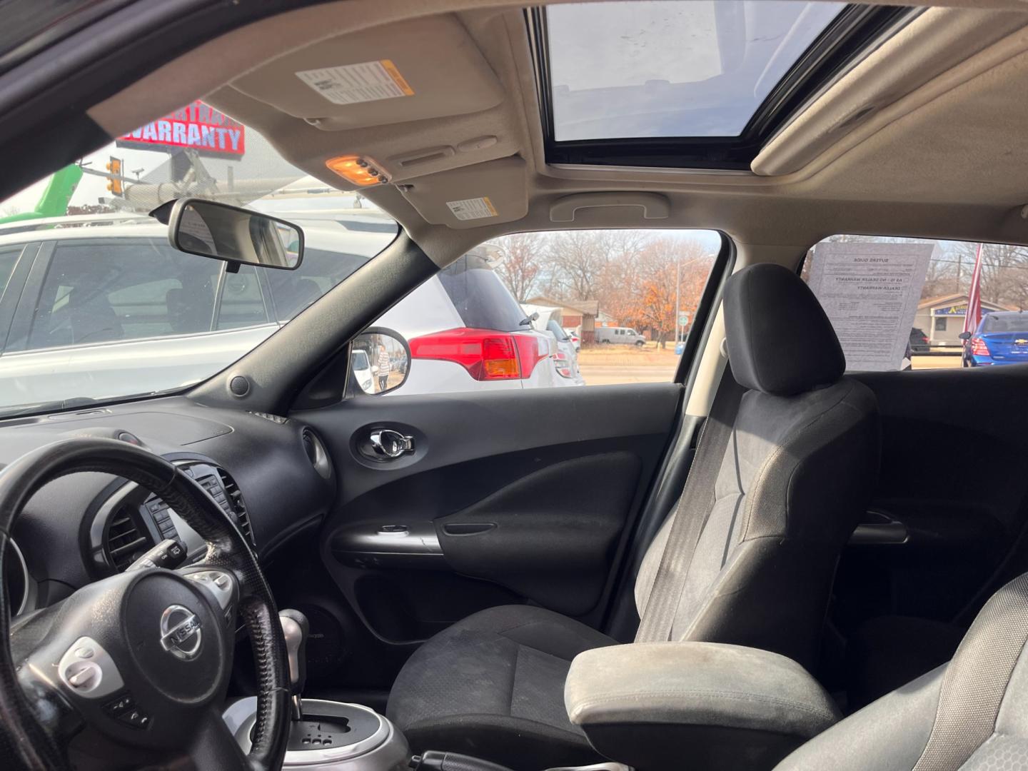 2013 BLACK NISSAN JUKE S; SL; SV; NISM S AWD (JN8AF5MV2DT) with an 1.6L L4 DOHC 16V engine, Continuously Variable Transmission transmission, located at 8101 E. Skelly Dr., Tulsa, OK, 74129, (918) 592-3593, 36.121891, -95.888802 - Photo#5